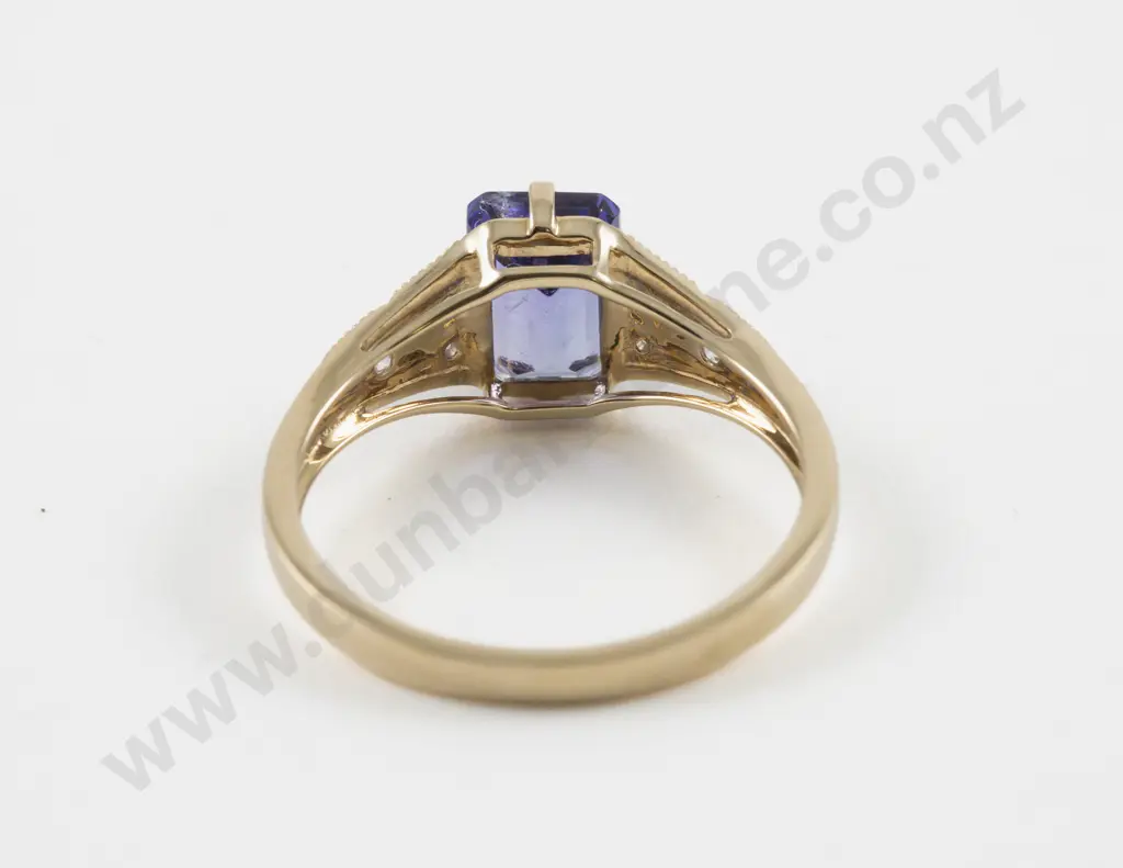 14ct Seven Stone Diamond and Tanzanite Ring central claw set emerald cut tanzanite Image 1++