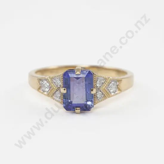 14ct Seven Stone Diamond and Tanzanite Ring central claw set emerald cut tanzanite