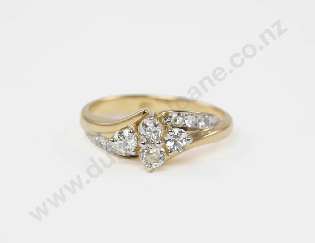 18ct Ten Stone Diamond Ring central claw set four old mine cut diamonds set with six round single cut shoulder diamonds Image 1++