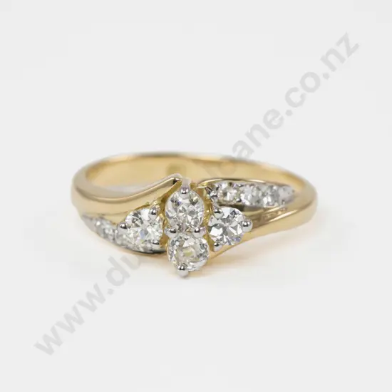 18ct Ten Stone Diamond Ring central claw set four old mine cut diamonds set with six round single cut shoulder diamonds