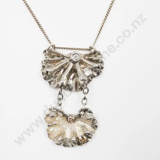S/S Crystal Set Floral Pendant. on s/s neck chain