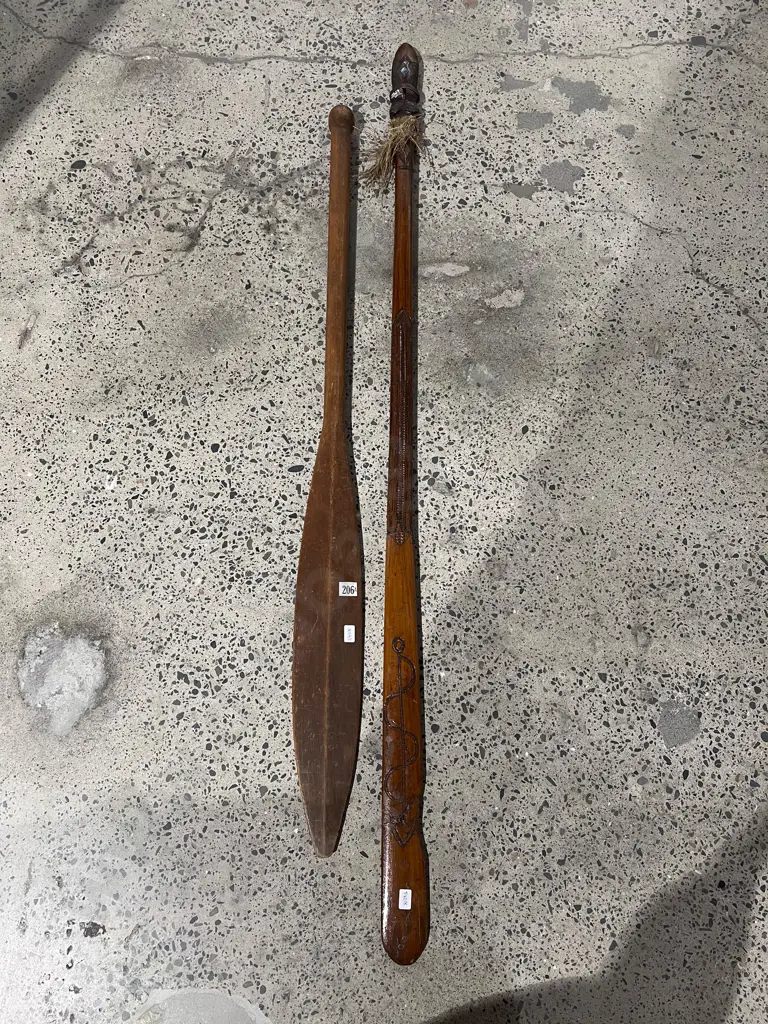 A late C20th Taiaha with Eclectic Decoration together with a Pacific Island Paddle Image 1++