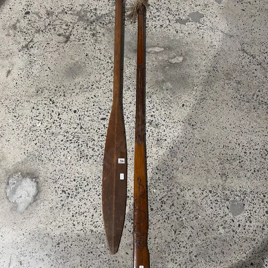 A late C20th Taiaha with Eclectic Decoration together with a Pacific Island Paddle