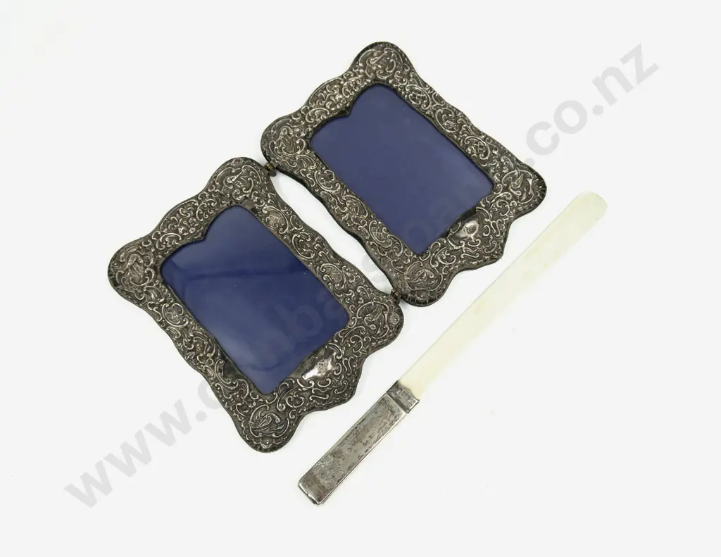 Stg Silver Handled Ivory Page Turner together with S/S Double Picture Frame Image 1++